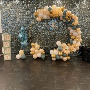 beautiful balloon garland on hoop sage green green pearl peach chrome gold mix