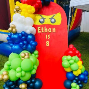 Red wall backdrop kids bday